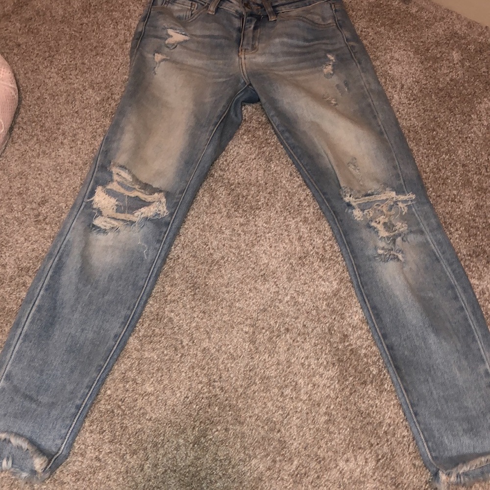 Kancan signatures, raw hemming ripped jeans.